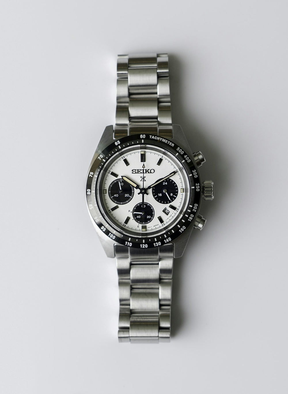 Style inspiration: a silver chronograph watch. Photograph by Paul Cuoco on Unsplash.